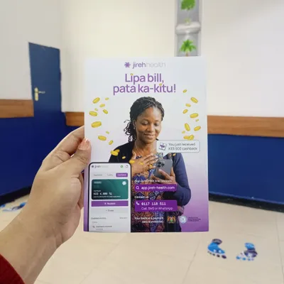 Hand holding a printed Jireh Health flyer: ‘Lipa bill, pata ka-kitu!’