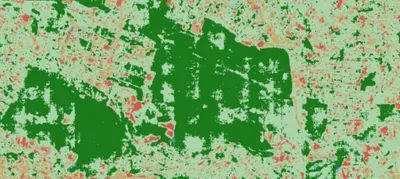 The model's land-cover prediction for Karura: dark green forest in the centre and west, surrounded by pale green and scattered red