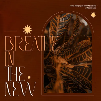 Poster in rust brown: 'Breathe in the new' in tall thin lettering beside an arch of leaves