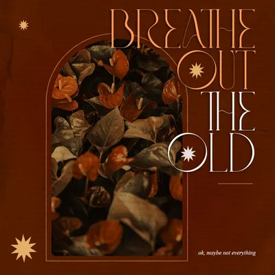 Poster in rust brown: 'Breathe out the old' in tall thin lettering beside an arch of dried autumn leaves